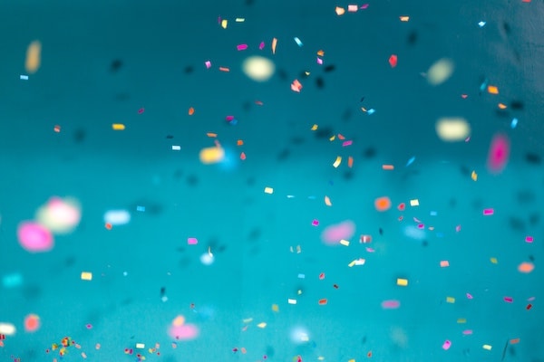 confetti on a turquoise background